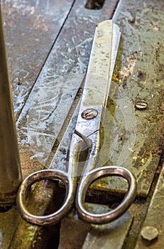 A pair of old scissors in a clothing manufacture