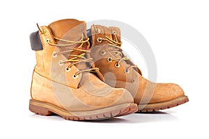 Pair of old yellow working boots.