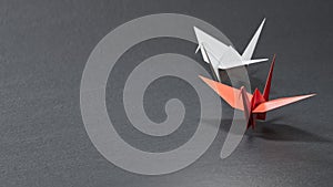 Pair of Origami bird lovers with heart. 3d illustration bird paper crane, bird paper craft for Hiroshima remembrance day photo