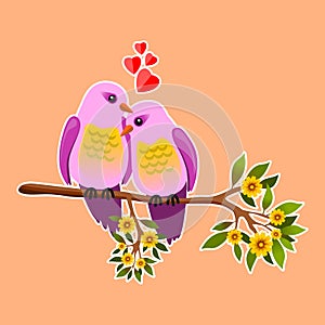 A pair of passionate and cozy birds on flowered branch