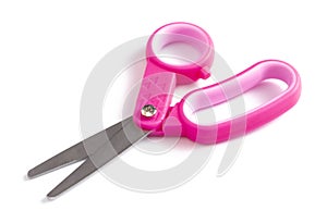 A Pair of Pink Kids Scissors Isolated on a White Background