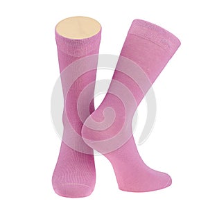 Pair of pink socks on mannequin