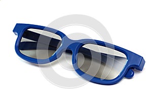 A pair of plastic blue framed kids children sunglasses white backdrop