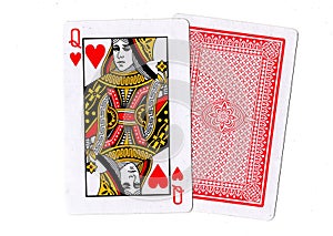 A pair of playing cards with the queen of hearts revealed.