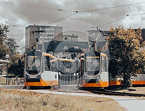 Pair of public transport trams waiting at the Zawady stop in Poznan, Poland