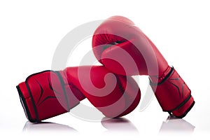 A pair of red boxing gloves