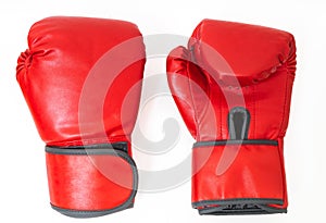 Pair of red boxing gloves isolated on white background