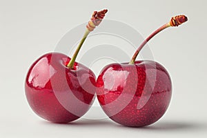 Pair of Red Cherry Standing Together Two ripe, red cherries placed next to each other on a flat surface