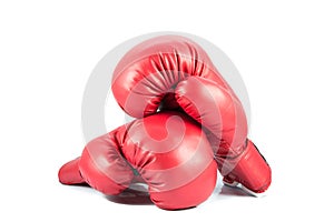 Pair of red leather boxing gloves isolated