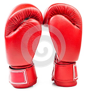 Pair of red leather boxing gloves isolated