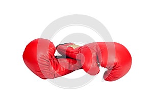 Pair of red leather boxing gloves or mitt isolated on white background