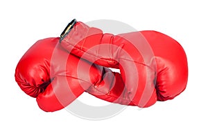 Pair of red leather boxing gloves or mitt isolated on white background