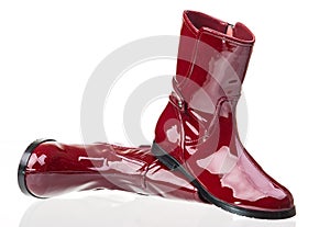 Pair of red patent leather female boots