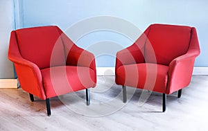 Pair of Red Retro Arm Chairs in Living Room