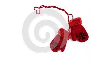 Pair of red winter mittens isolated on white background