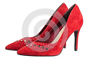 Pair of red women`s shoes on a white background. Suede shoes. File contains clipping path