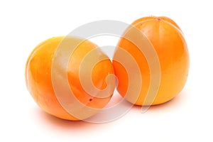Pair of ripe persimmons