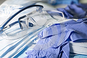 Pair of Safety Glasses, Masks And Gloves To Prevent The Spread Of Infection