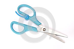 A pair of scissors with spring opening