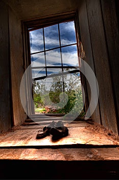 Pair of shoes by window