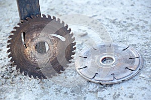 The pair of silver black color old mettle iron cutter blade on the grey background