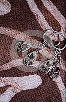 A pair of silver earings