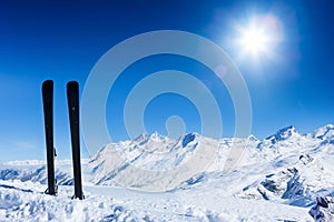 Pair of skis in snow. Winter vacations