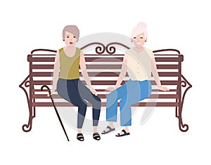 Pair of smiling elderly women sitting on bench and talking. Happy meeting of two old ladies or friends. Cute flat female
