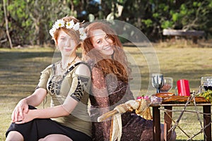 Pair of Smiling Pagan Women