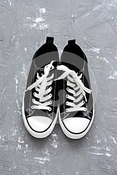 Pair of sneakers on greay background
