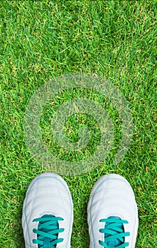 Pair Of Soccer Shoes On green grass field