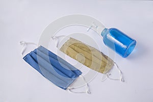 Pair of soft cotton mask with bottle of sanitiser