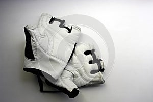 A pair of sport gloves on a white background