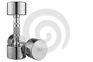 A pair of steel chrome dumbbells, weighing 5 kilograms, stands on a white background, isolate