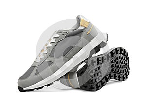 Pair of stylish grey sneakers isolated on white