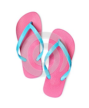 Pair of stylish pink flip flops isolated on white