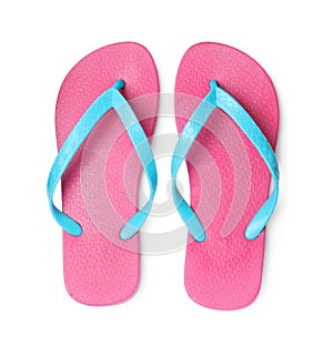 Pair of stylish pink flip flops isolated on white, top view