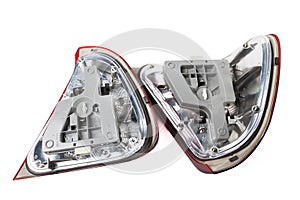 A pair of taillights of a stop signal for a German auto - optical equipment of white and red color on a white isolated background