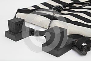 Pair of tefillin , A symbol of the Jewish people, a pair of tefillin with black straps, isolated on a white background