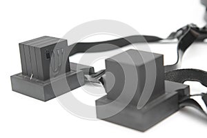 Pair of tefillin , A symbol of the Jewish people, a pair of tefillin with black straps, isolated on a white background photo