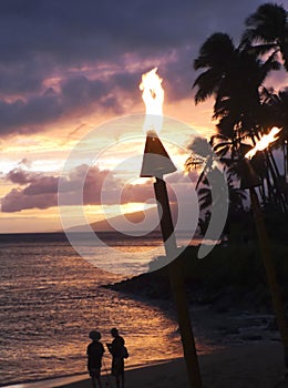 A Pair of Tiki Torches on the Beach, Napili Bay, Maui, Hawaii