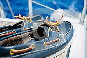 A pair of topsiders on yacht deck. Yachting