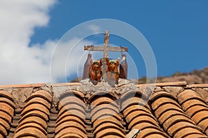 A pair of Toritos de Pucara or Little Bulls of Pucara at the rooftop photo