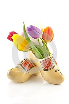 Pair of traditional Dutch wooden shoes with tulips