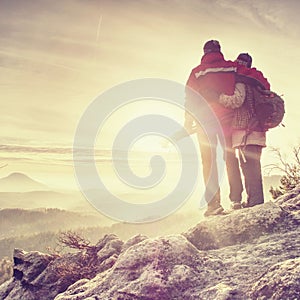 Polsko Pair of travelers on peak trail. Two photographers, a man and woman photo