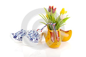 Pair of typical Dutch wooden shoes with tulips