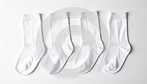White, soft socks isolated in top view.