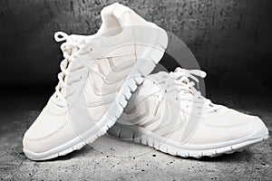 Pair of white sports shoes