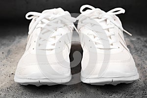 Pair of white sports shoes