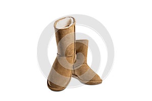 Pair of winter ugg boot isolated on white background